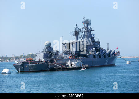 Sevastopol, Ukraine - May 7, 2013: Russian cruiser Moskva anchored in the bay of Sevastopol, Crimea, Ukraine on May 7, 2013. Ship prepares to the nava Stock Photo