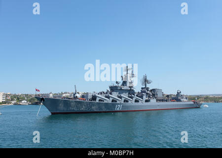 Sevastopol, Ukraine - May 7, 2013: Russian cruiser Moskva anchored in the bay of Sevastopol, Crimea, Ukraine on May 7, 2013. Ship prepares to the nava Stock Photo