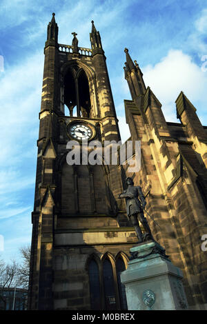 Church of Saint Thomas the martyr and statue of Saint George having slayed the dragon Stock Photo