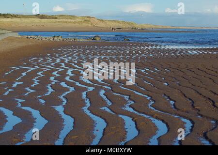Symmetrical Parallel Wave Formed Ripple Marks in Littoral Beach Sand. Abstract Seascape, Aberdeen, Scotland, UK. Stock Photo