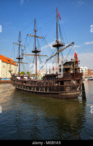 Galleon style Black Pearl pirate sailing ship on Motlawa river, popular tourist attraction in city of Gdansk, Poland, Europe. Stock Photo