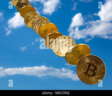 Bitcoin coins dropping from the sky Stock Photo