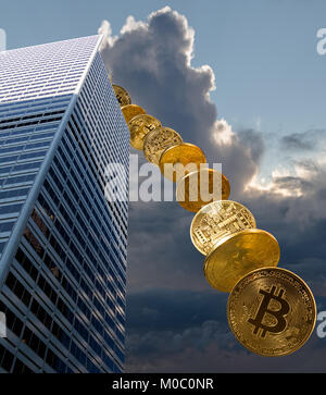 Bitcoin coins dropping from building Stock Photo