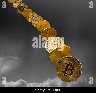 Bitcoin coins dropping from the sky Stock Photo