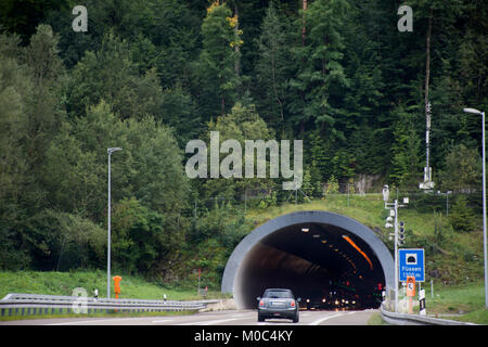 Travelers people driving car on the road passed mountain in car tunnel go to Italy at Fussen city on September 2, 2017 in Tyrol, Austria Stock Photo