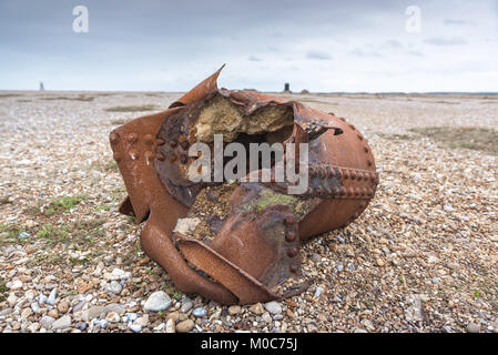 Orford Ness, a large bomb casing on the beach at Orford Ness, a relic from when the site was a secret defence research facility during the 1940s & 50s Stock Photo