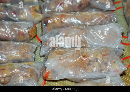 Closeup of pork spring rolls in rice wrappers Stock Photo