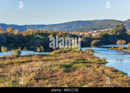 View from Roman bridge on Lima River in Ponte de Lima city, part of the district of Viana do Castelo, Norte region of Portugal Stock Photo