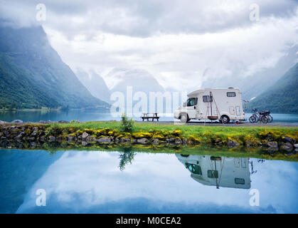 Family vacation travel RV, holiday trip in motorhome, Caravan car Vacation. Beautiful Nature Norway natural landscape. Stock Photo