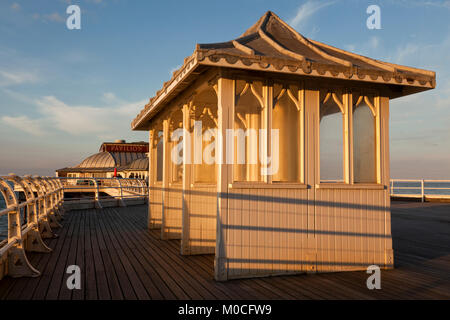 Sheltered seats on Cromer Pier, Norfolk, UK Stock Photo