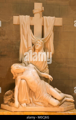 LONDON, GREAT BRITAIN - SEPTEMBER 17, 2017: The marble statue of Pieta  in church of St. James Spanish Place by J.F. Bentley from end of 19. cent. Stock Photo