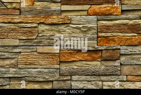 Dry Stacked Slate Rock Background in Sandstone Colors Stock Photo