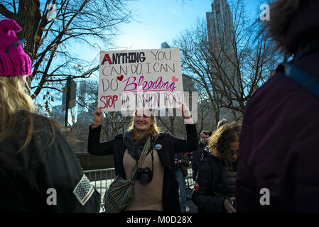 New York, USA. 20th Jan, 2018. Woman holds 'Stop the tampon tax' sign during 2018 Women's March in New York City. One year after the inauguration of President Donald Trump, women and men in cities acorss the U.S. protested against the president. Credit: Joseph Reid/Alamy Live News Stock Photo