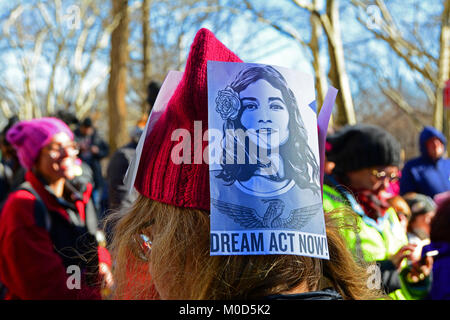 New York, USA. 20th Jan, 2018. Woman at march wearing her pink hat decorated with a Dream Act Now poster. Credit: Rachel Cauvin/Alamy Live News Stock Photo
