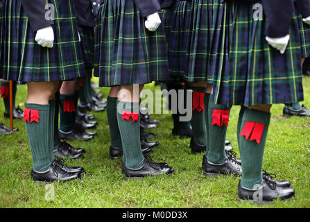 Student members of the Pipes and Drums band from Gordon's school in Surrey gather in Whitehall Gardens, London, during their annual parade along Whitehall, London, to the statue of General Gordon of Khartoum for a memorial service to commemorate his death. Stock Photo