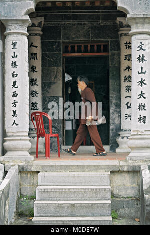 Old man at Thai Vi Temple in Tam Coc, Ninh Binh Province, north Vietnam Stock Photo