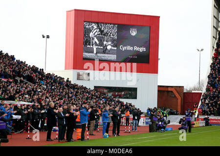 Fans and both teams observe a minute's applause in memory of the late Cyrille Regis before the Premier League match at the bet365 Stadium Stock Photo