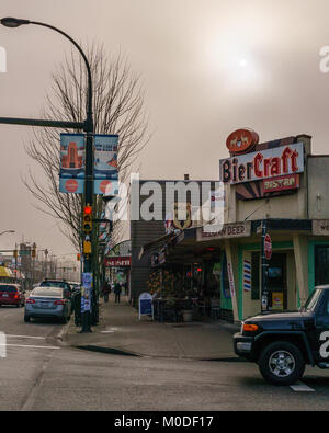 VANCOUVER, CANADA - January 14, 2018: BierCraft bistro on Cambie street and 17th Avenue Vancouver BC at foggy day Stock Photo