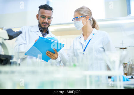 Young Scientists Working in Laboratory Stock Photo