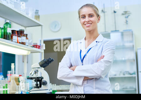 Cheerful Female Scientist in Lab Stock Photo