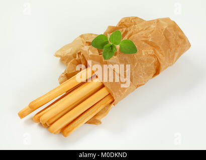 crispy bread sticks in paper bag Stock Photo