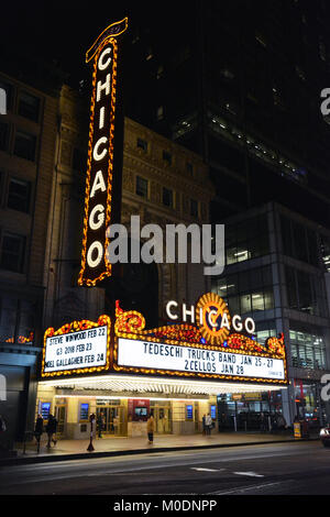 The iconic marquee in front of the Chicago Theater is an unofficial emblem of the city and frequently featured in movies and TV shows set in Chicago. Stock Photo