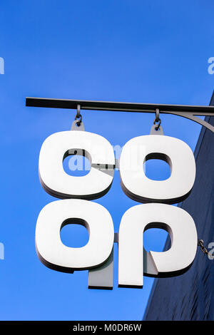 The new Co-op logo, introduced in 2016 on outside wall UK Stock Photo