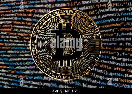 bitcoin on coding background Stock Photo