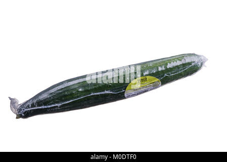 Cucumber wrapped in plastic, supermarket plastic packaging. Stock Photo