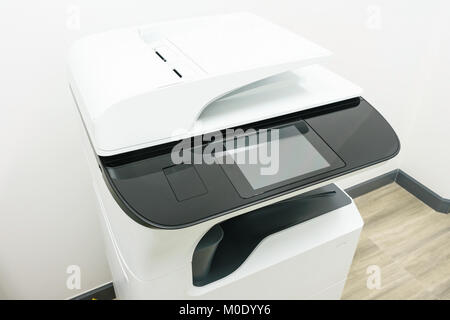 photocopier is a machine that makes paper copies of documents and other visual images ,close-up multi-function device, printer scanner, copier Stock Photo