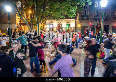 Buenos Aires Argentina,San Telmo,Plaza Dorrego,night evening,tango dancers,dancing,man men male,woman female women,couple,audience,performing,Hispanic Stock Photo