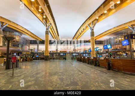 Oslo, Norway - January 2018: Oslo Gardermoen International Airport departure terminal architecture. The Oslo Gardermoen airport has biggest passenger Stock Photo