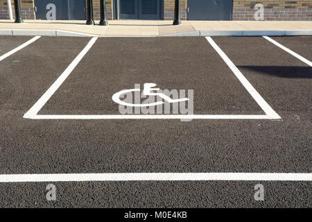 Disabled user car park space with wheelchair symbol Stock Photo