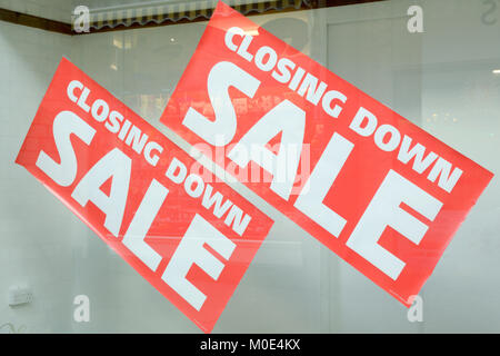 Closing Down Sale signs in shop window Stock Photo