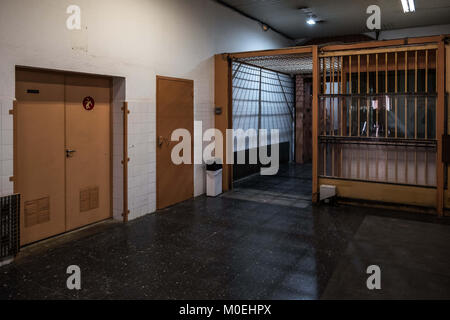 Barcelona, Catalonia, Spain. 21st Jan, 2018. First door of access to the interior of the closed enclosure. After 113 years in service, the Barcelona's Modelo Prison ceased its activity in June of 2017. In the middle of the urban fabric of the city has been constant neighborhood activity to achieve its decommissioning. Today, finally, the Mayor of Barcelona, Ada Colau, has delivered symbolically the penitentiary centre to the city of Barcelona. Starting today, and as far as the presentation of urban redevelopment projects the centre can be visited by citizens. (Credit Image: © Paco Freire/