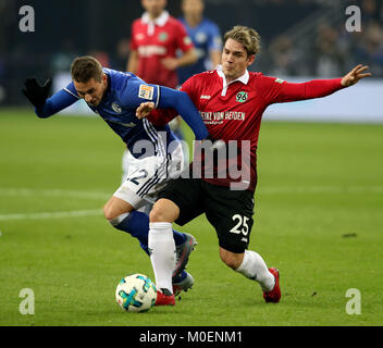 Gelsenkirchen, Germany. 21st Jan, 2018. Oliver Sorg (R) of Hannover and Marko Pjaca of Schalke battle for the ball during the Bundesliga match between FC Schalke 04 and Hannover 96 at Veltins-Arena in Gelsenkirchen, Germany, January 21, 2018. Credit: Joachim Bywaletz/Xinhua/Alamy Live News Stock Photo