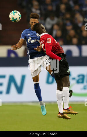 Gelsenkirchen, Germany. 21st Jan, 2018. Ihlas Bebou (R) of Hannover and Thilo Kehrer of Schalke battle for the ball during the Bundesliga match between FC Schalke 04 and Hannover 96 at Veltins-Arena in Gelsenkirchen, Germany, Jan. 21, 2018. Credit: Joachim Bywaletz/Xinhua/Alamy Live News Stock Photo