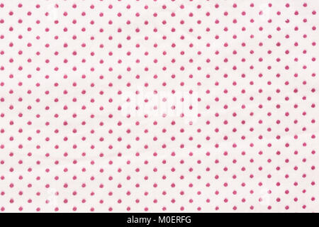 White and red tiny polka dots background. Stock Photo