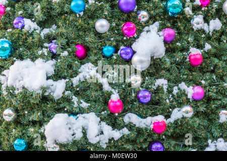 Christmas tree decorations outdoors with snow, Hereford, UK Stock Photo