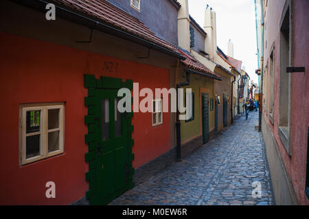 PRAGUE, CZECH REPUBLIC - APRIL, 26, 2017: Colorful and cosy Zlata ulicka - Golden lane, one of the most attactive place for tourists in old town and c Stock Photo