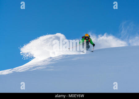 Man skiing in fresh powder snow, Alps, Kitzsteinhorn, Salzburg, Austria Stock Photo