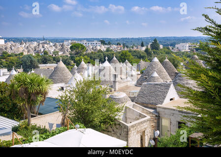Panoramic view of famous Alberobello town with trulli houses and their conical roofs Stock Photo