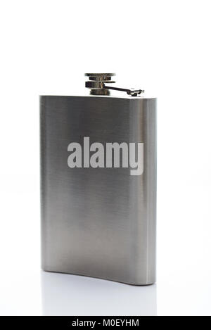 Metal flask stand side 45 degree isolated on white background. One silver shiny flask for drink Stock Photo