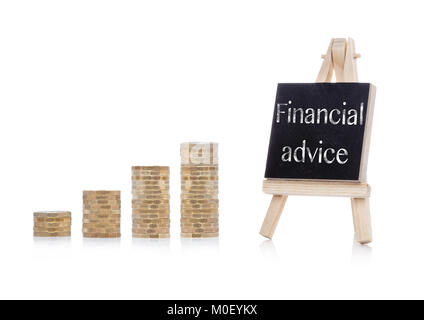 Financial advice concept text on chalkboard with coins on white background Stock Photo
