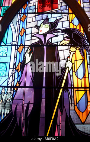 Paris - France, Circa June, 2013. Colorful Disney Stain glass window from sleeping beauty, situated in the Disney castle of Paris Disney resort. Stock Photo