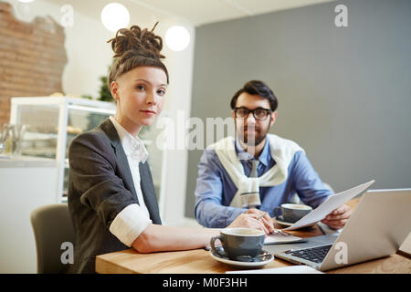 Managers in cafe Stock Photo