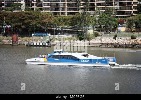 BRISBANE, AUSTRALIA - MARCH 20, 2008: People ride the CityCat catamaran, public ferry service in Brisbane. 21 CityCat vessels are operated by Transdev Stock Photo