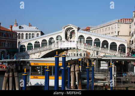 VENICE - SEPTEMBER 16: Tourists visit Rialto Bridge on September 16, 2009 in Venice. Venice Old Town is a UNESCO World Heritage Site. In summer up to  Stock Photo