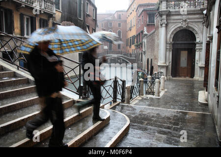 Venice, Italy - old town in heavy rain. Rainy autumn view. Stock Photo