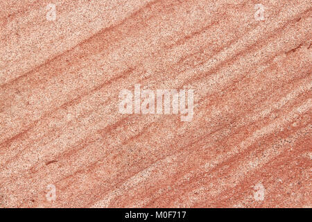 Red sandstone background texture. Abstract solid flat stone surface. Stock Photo